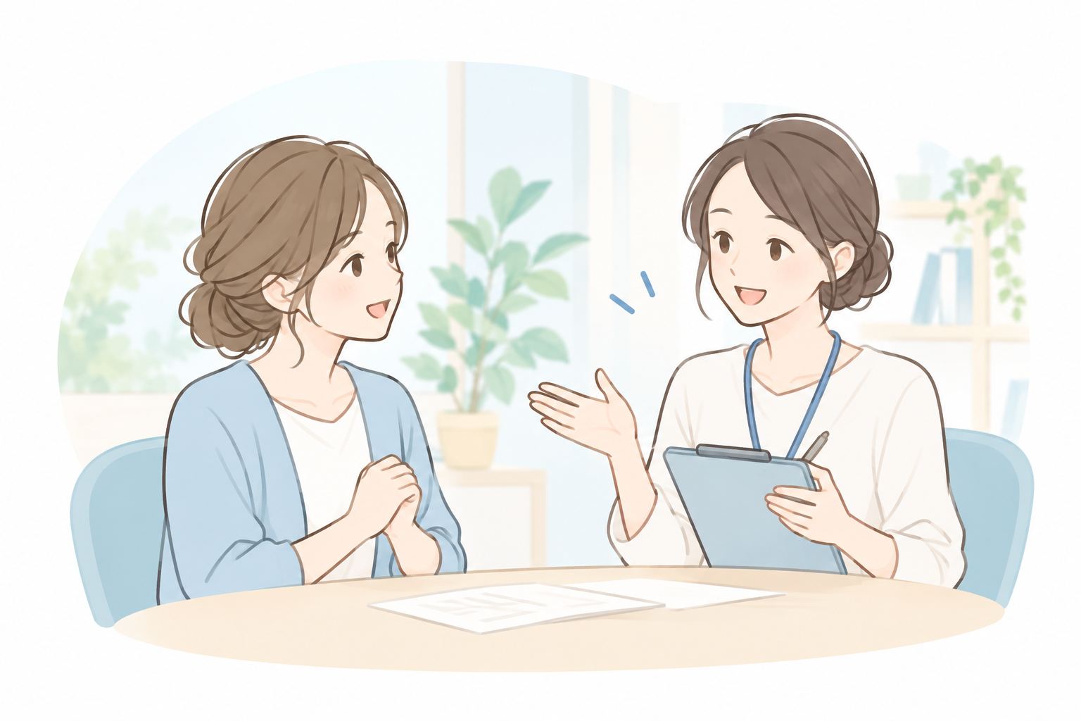 笑顔で向き合う相談室での面談の様子